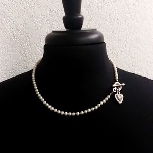 Faux pearls with silver toned heart toggle clasp